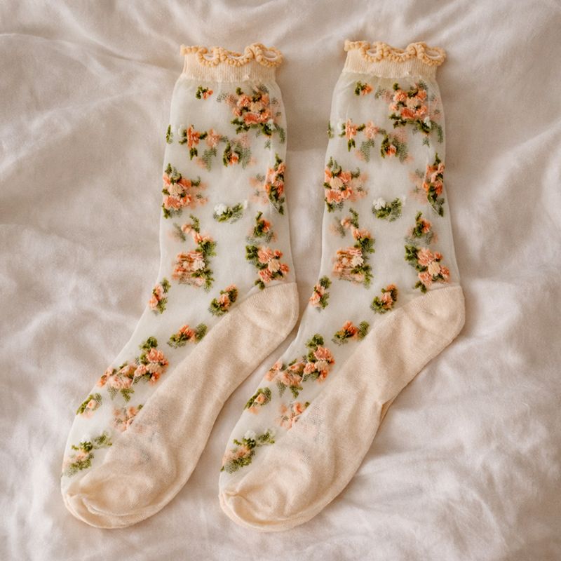 Zeķes, ziedi caurspīdīgas